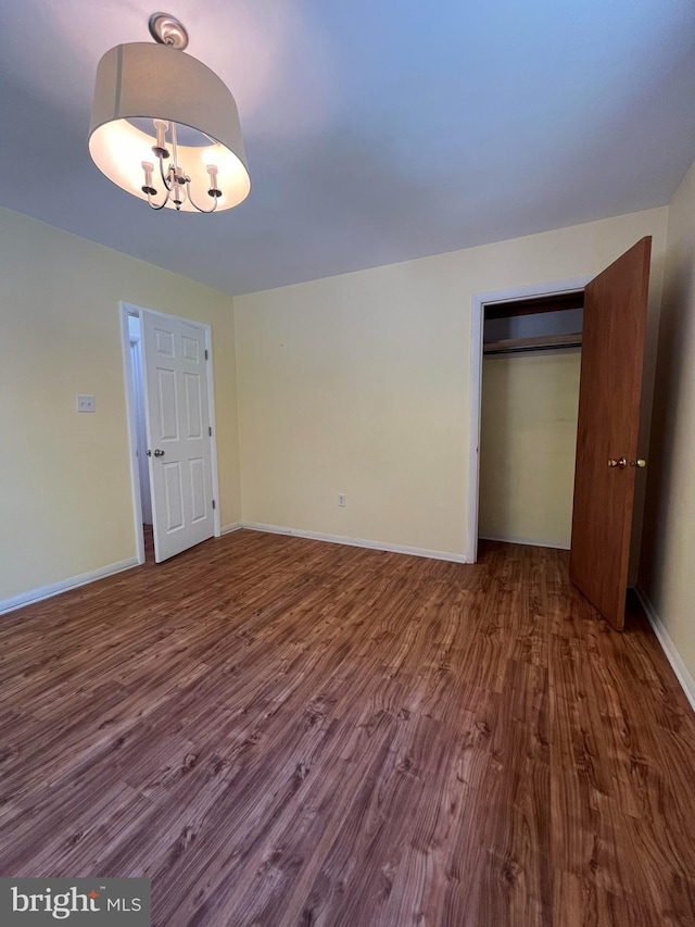 23 Beaconhill Rd, Ocean Pines, MD 21811 - empty room featuring dark wood-style flooring and baseboards
