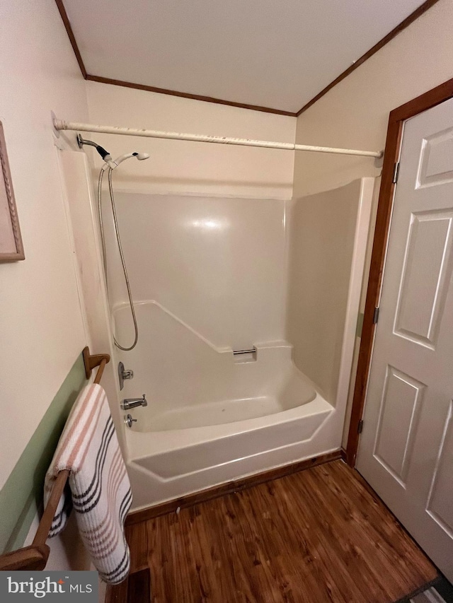 23 Beaconhill Rd, Ocean Pines, MD 21811 - full bath with  shower combination, wood finished floors, and crown molding