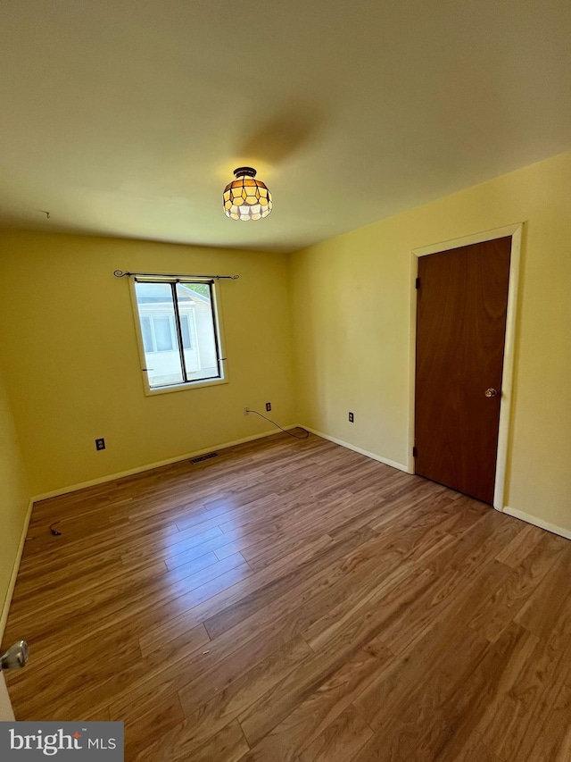 23 Beaconhill Rd, Ocean Pines, MD 21811 - spare room with wood finished floors and baseboards