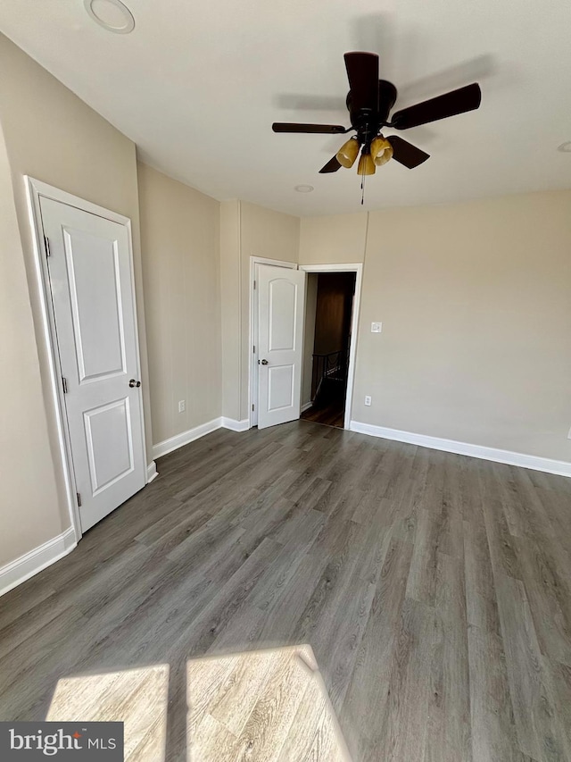 805 W Bristol St, Philadelphia, PA 19140 - spare room featuring wood finished floors, ceiling fan, and baseboards