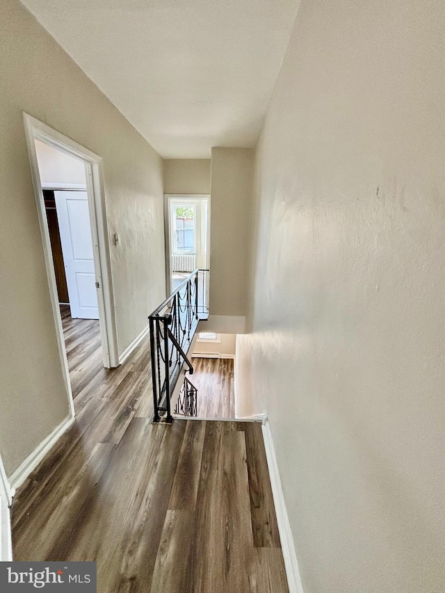 805 W Bristol St, Philadelphia, PA 19140 - corridor with an upstairs landing, baseboards, and wood finished floors