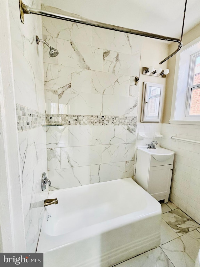 805 W Bristol St, Philadelphia, PA 19140 - full bathroom featuring shower / washtub combination, vanity, tile walls, and marble finish floors