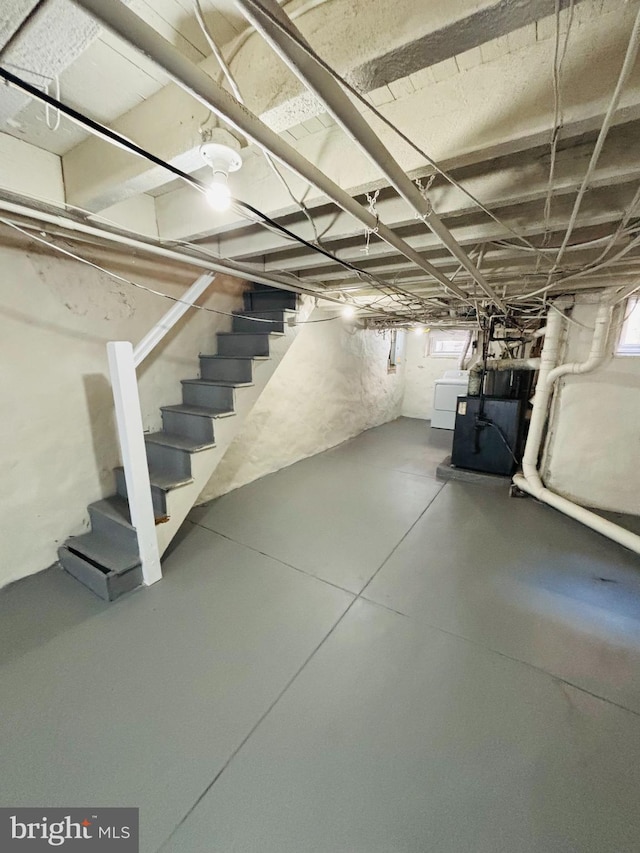 805 W Bristol St, Philadelphia, PA 19140 - basement featuring stairway, washer / dryer, and healthy amount of natural light