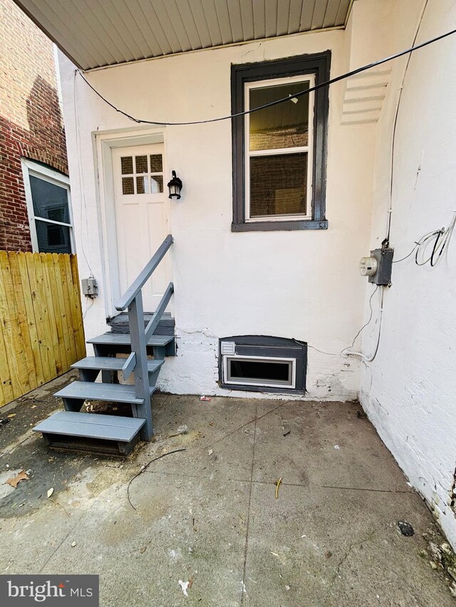 805 W Bristol St, Philadelphia, PA 19140 - property entrance with stucco siding