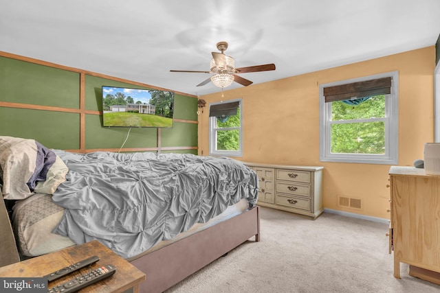 9501 Nottingham Dr, Upper Marlboro, MD 20772 - bedroom with light carpet, baseboards, and ceiling fan