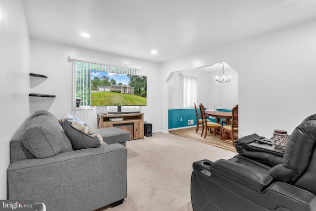 9501 Nottingham Dr, Upper Marlboro, MD 20772 - carpeted living area with a chandelier, recessed lighting, and baseboards