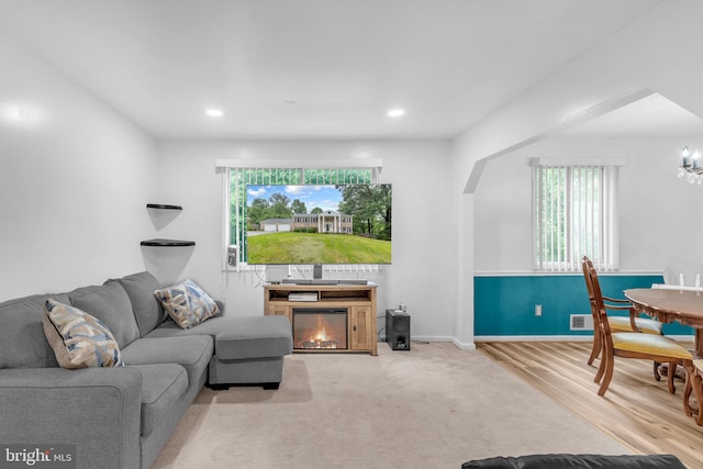 9501 Nottingham Dr, Upper Marlboro, MD 20772 - living area featuring plenty of natural light, recessed lighting, baseboards, and a glass covered fireplace