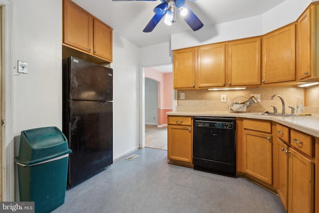 2029 Norhurst Way S, Baltimore, MD 21228 - kitchen with black appliances, a sink, ceiling fan, light countertops, and decorative backsplash
