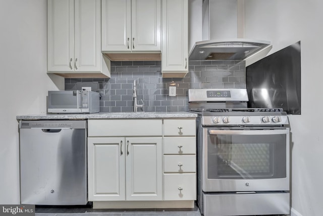 4201 Cathedral Ave NW Unit 918W, Washington, DC 20016 - kitchen with appliances with stainless steel finishes, ventilation hood, tasteful backsplash, white cabinetry, and a sink