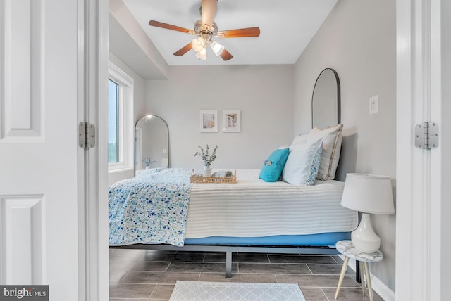 4201 Cathedral Ave NW Unit 918W, Washington, DC 20016 - bedroom with wood tiled floors, baseboards, and a ceiling fan