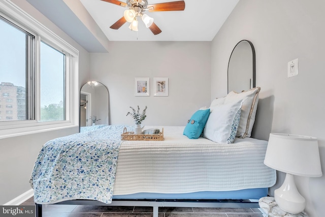 4201 Cathedral Ave NW Unit 918W, Washington, DC 20016 - bedroom featuring a ceiling fan, baseboards, and wood finished floors