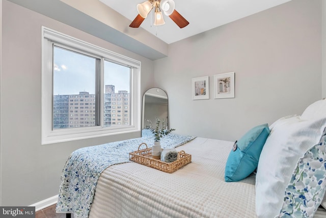 4201 Cathedral Ave NW Unit 918W, Washington, DC 20016 - bedroom with baseboards, wood finished floors, and ceiling fan