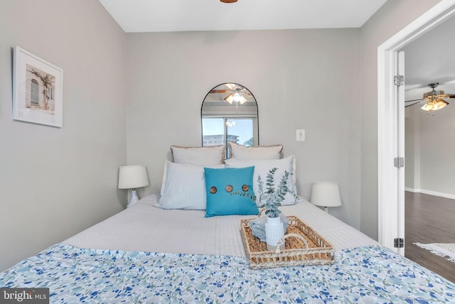 4201 Cathedral Ave NW Unit 918W, Washington, DC 20016 - bedroom with wood finished floors, baseboards, and ceiling fan