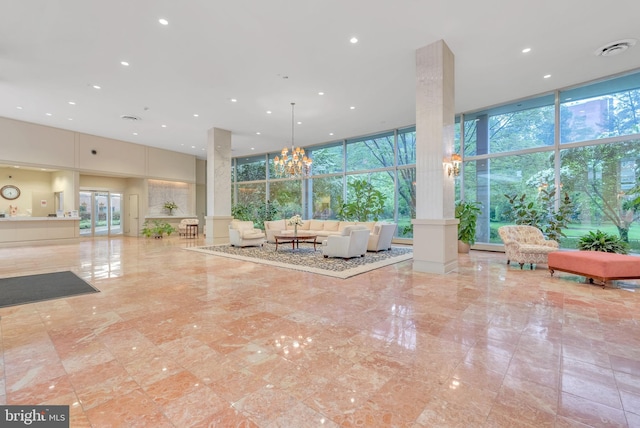 4201 Cathedral Ave NW Unit 918W, Washington, DC 20016 - community lobby featuring floor to ceiling windows, recessed lighting, and a towering ceiling