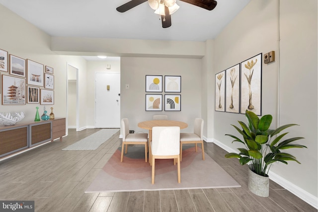 4201 Cathedral Ave NW Unit 918W, Washington, DC 20016 - dining space featuring wood finished floors, a ceiling fan, and baseboards