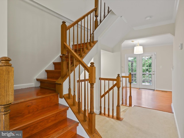 10612 Winfield Loop, Manassas, VA 20109 - stairway with baseboards, ornamental molding, and carpet floors