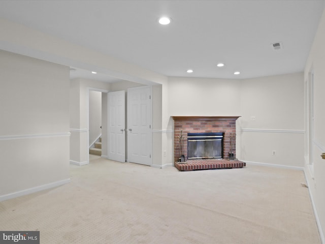 10612 Winfield Loop, Manassas, VA 20109 - unfurnished living room with recessed lighting, carpet floors, a fireplace, baseboards, and stairway
