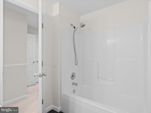 10612 Winfield Loop, Manassas, VA 20109 - bathroom featuring baseboards and bathing tub / shower combination