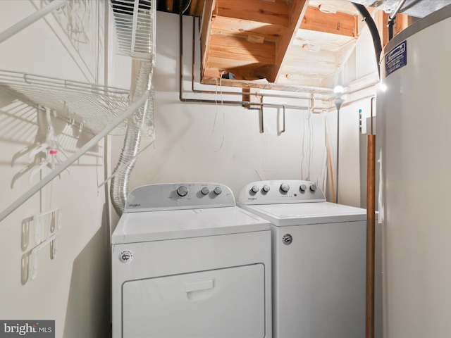 10612 Winfield Loop, Manassas, VA 20109 - laundry room featuring washer and clothes dryer and water heater