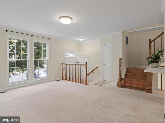 10612 Winfield Loop, Manassas, VA 20109 - empty room with carpet, baseboards, stairway, and ornamental molding