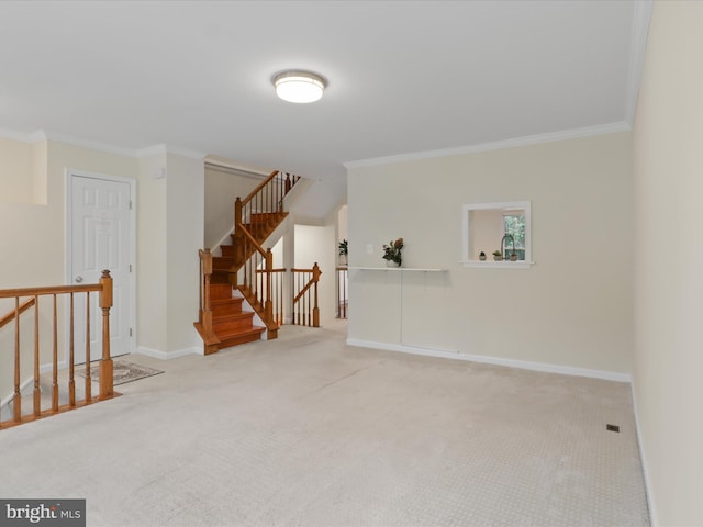 10612 Winfield Loop, Manassas, VA 20109 - carpeted empty room with ornamental molding, baseboards, and stairway