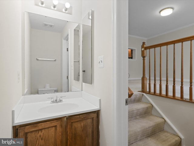 10612 Winfield Loop, Manassas, VA 20109 - bathroom featuring ornamental molding, vanity, and toilet
