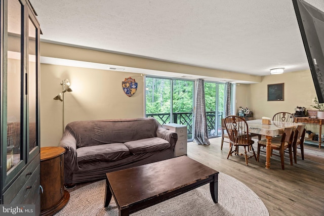 43 Cranberry Ct, Marlton, NJ 08053 - living room featuring light wood-style flooring and a textured ceiling