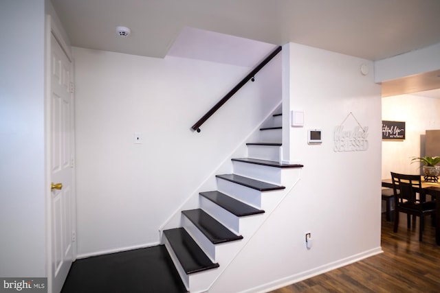 6408 Jefferson Pl, Glen Burnie, MD 21061 - stairs featuring wood finished floors and baseboards