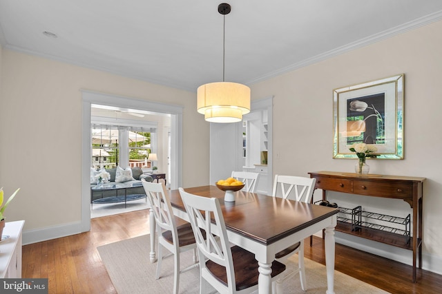 1937 38th St NW, Washington, DC 20007 - dining area featuring wood finished floors and ornamental molding