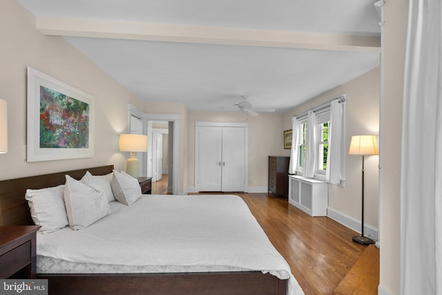 1937 38th St NW, Washington, DC 20007 - bedroom with wood finished floors, beam ceiling, and a ceiling fan