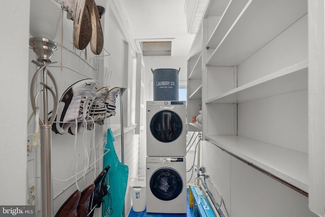 1937 38th St NW, Washington, DC 20007 - washroom featuring stacked washing machine and dryer