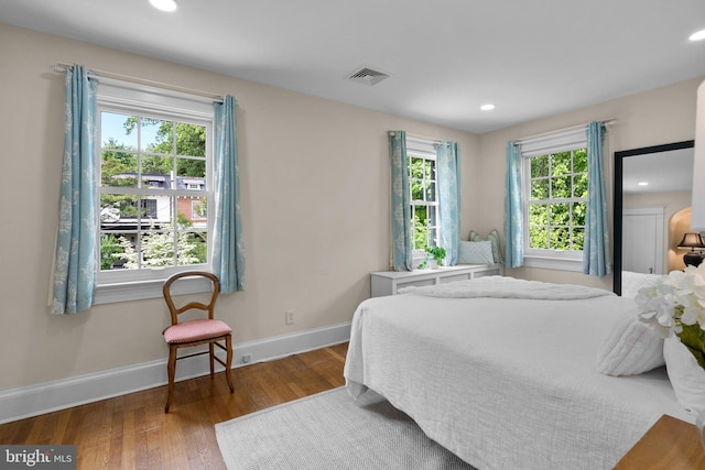 1937 38th St NW, Washington, DC 20007 - bedroom featuring multiple windows, wood finished floors, and recessed lighting