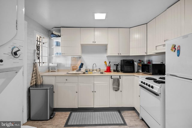 1937 38th St NW, Washington, DC 20007 - kitchen with white appliances, light wood finished floors, and light countertops