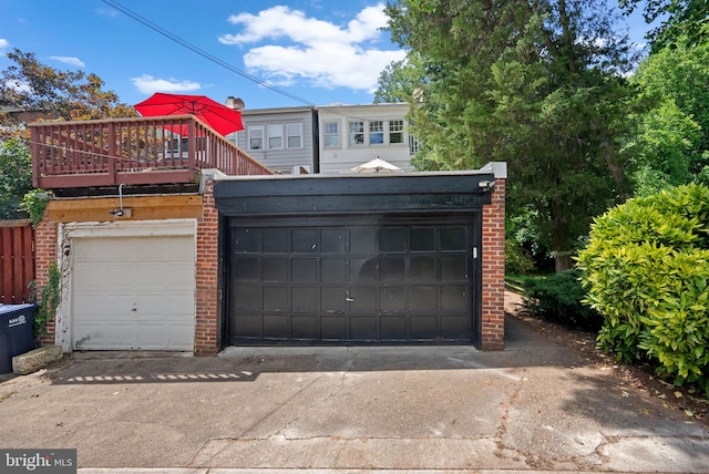 1937 38th St NW, Washington, DC 20007 - view of front of property featuring brick siding and a garage