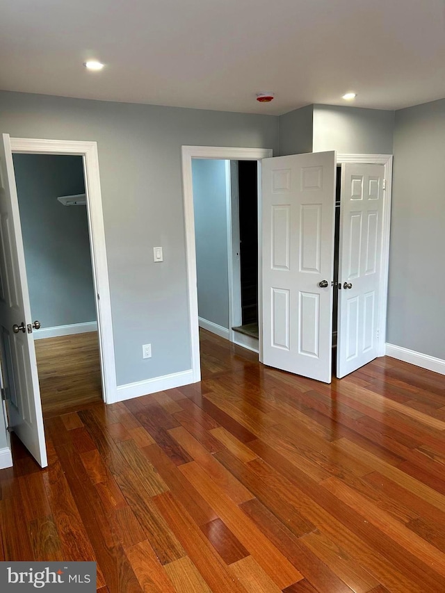 2712 N 6th St, Harrisburg, PA 17110 - unfurnished bedroom featuring a closet, baseboards, wood finished floors, and recessed lighting