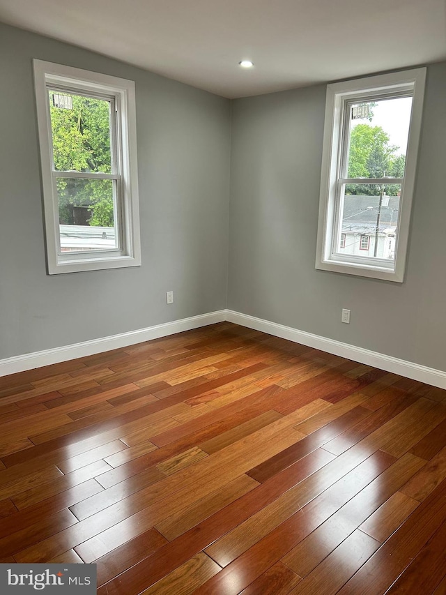 2712 N 6th St, Harrisburg, PA 17110 - spare room with wood-type flooring, baseboards, and recessed lighting