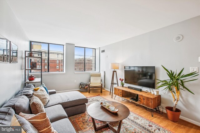 1312 Massachusetts Ave NW Unit 604, Washington, DC 20005 - living room with wood finished floors and baseboards