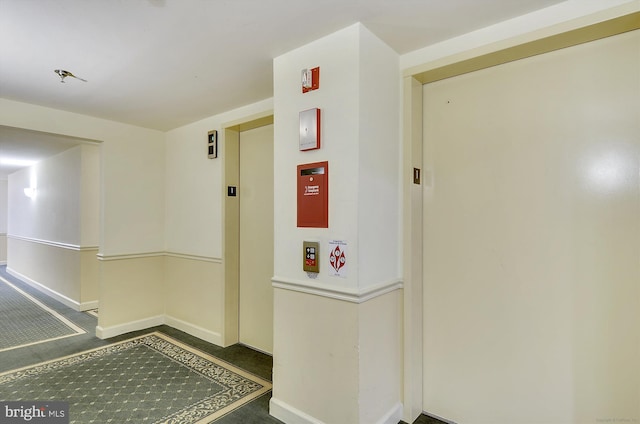 1312 Massachusetts Ave NW Unit 604, Washington, DC 20005 - corridor with elevator and baseboards