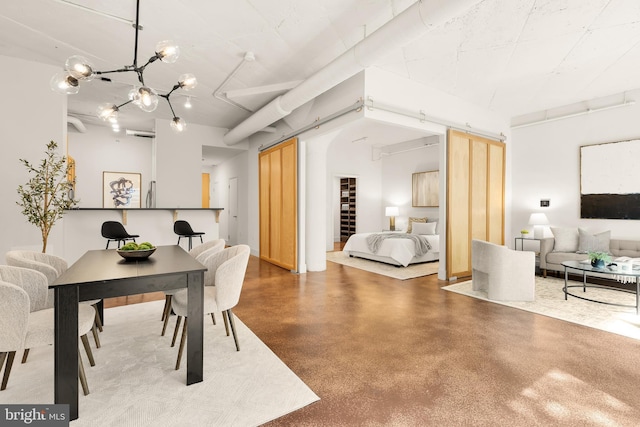 1700 Kalorama Rd NW Unit 206, Washington, DC 20009 - dining space featuring concrete floors and a chandelier
