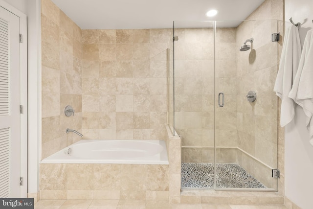 1700 Kalorama Rd NW Unit 206, Washington, DC 20009 - full bath featuring a stall shower, tiled tub, and a closet