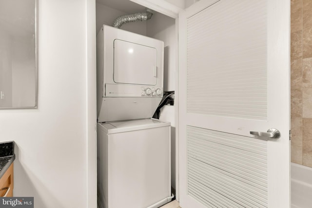 1700 Kalorama Rd NW Unit 206, Washington, DC 20009 - washroom with stacked washer and clothes dryer