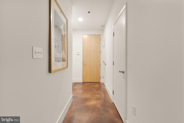 1700 Kalorama Rd NW Unit 206, Washington, DC 20009 - hallway with concrete flooring, baseboards, and recessed lighting