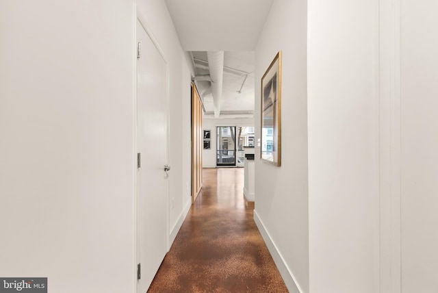 1700 Kalorama Rd NW Unit 206, Washington, DC 20009 - hallway with concrete floors and baseboards