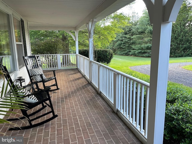 241 Clayhill Dr, Winchester, VA 22602 - covered porch with a lawn
