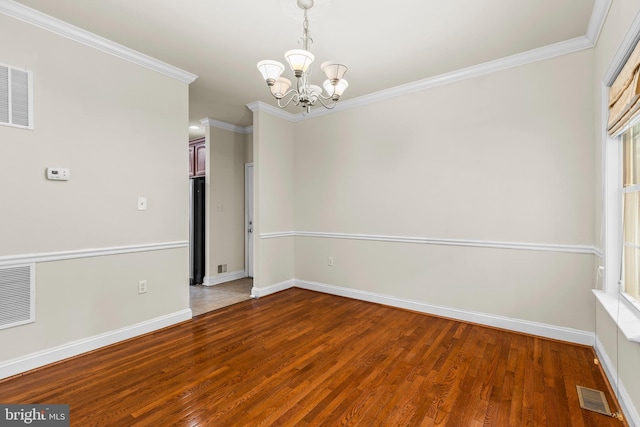 22 Berry Ln, Harpers Ferry, WV 25425 - unfurnished room with a chandelier, wood finished floors, crown molding, and baseboards
