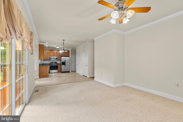22 Berry Ln, Harpers Ferry, WV 25425 - unfurnished living room featuring light colored carpet, baseboards, ceiling fan, ornamental molding, and a chandelier