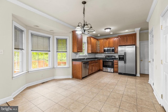 22 Berry Ln, Harpers Ferry, WV 25425 - kitchen featuring stainless steel appliances, dark countertops, a sink, crown molding, and light tile patterned floors
