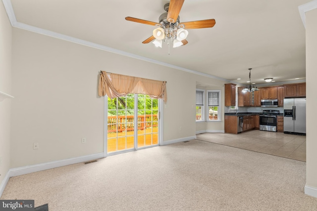 22 Berry Ln, Harpers Ferry, WV 25425 - unfurnished living room with baseboards, ornamental molding, ceiling fan, and a chandelier
