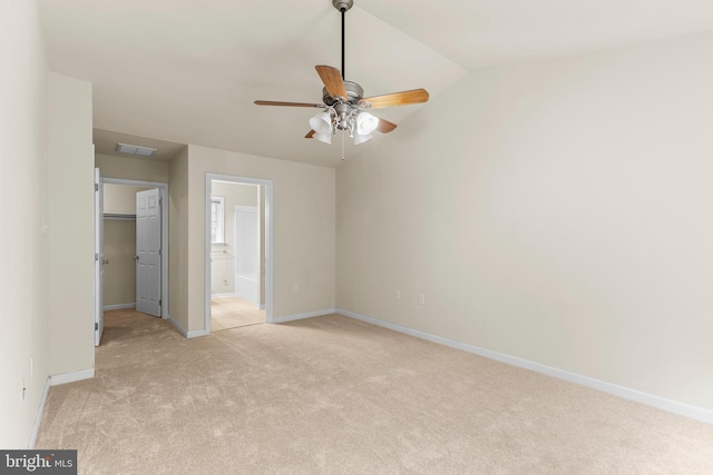 22 Berry Ln, Harpers Ferry, WV 25425 - unfurnished bedroom with light carpet, a spacious closet, vaulted ceiling, baseboards, and ensuite bath