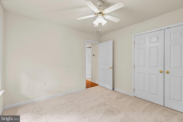 22 Berry Ln, Harpers Ferry, WV 25425 - unfurnished bedroom featuring carpet flooring, baseboards, ceiling fan, and a closet